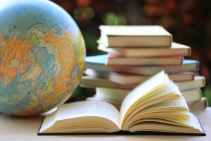 Open,Book,On,The,Table,In,The,Library,Many,Books